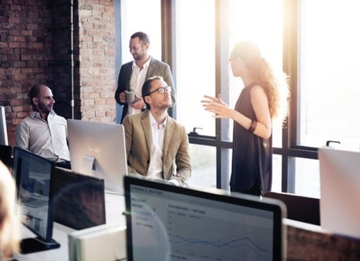 Group of co-workers discussing work